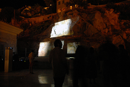 Fragments of the Unseen by Medea Electronique, projected on the rocks of the Historical Archives Museum Hydra, 2011.
